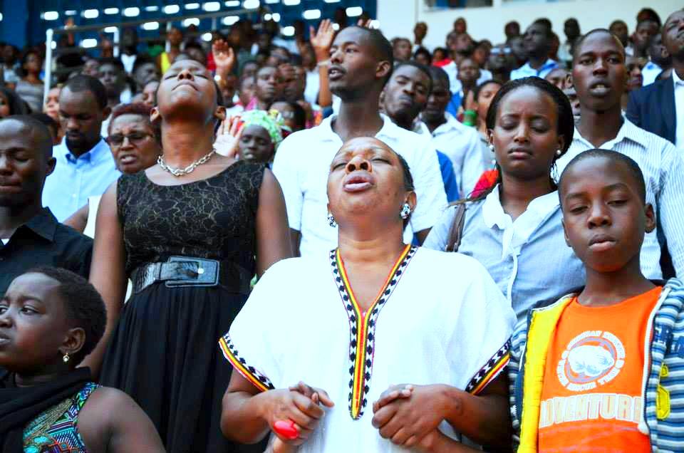 Christians praying at the Rwanda Shima Mana crusade in August 2015 at Amahoro Stadium 