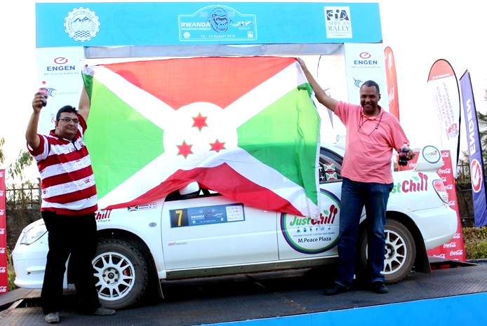 Burundi's Bukera Valery (r) celebrates after winning Rwanda Mountain gorilla rally